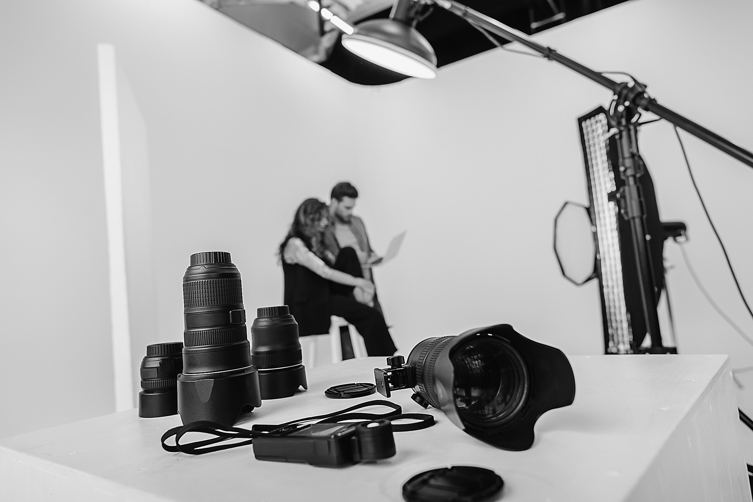 Photography — Photographer framing a subject through a stills camera on location