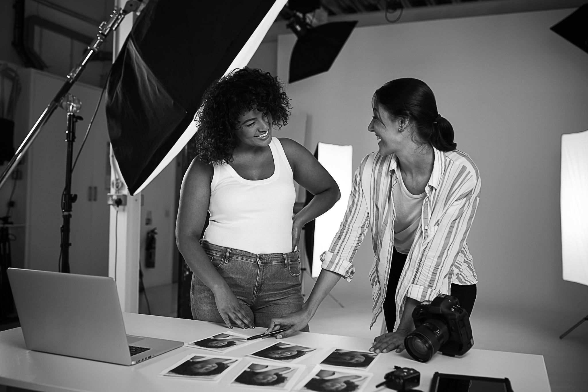 photographer-with-female-client-editing-images-fro-2023-11-27-04-55-19-utc