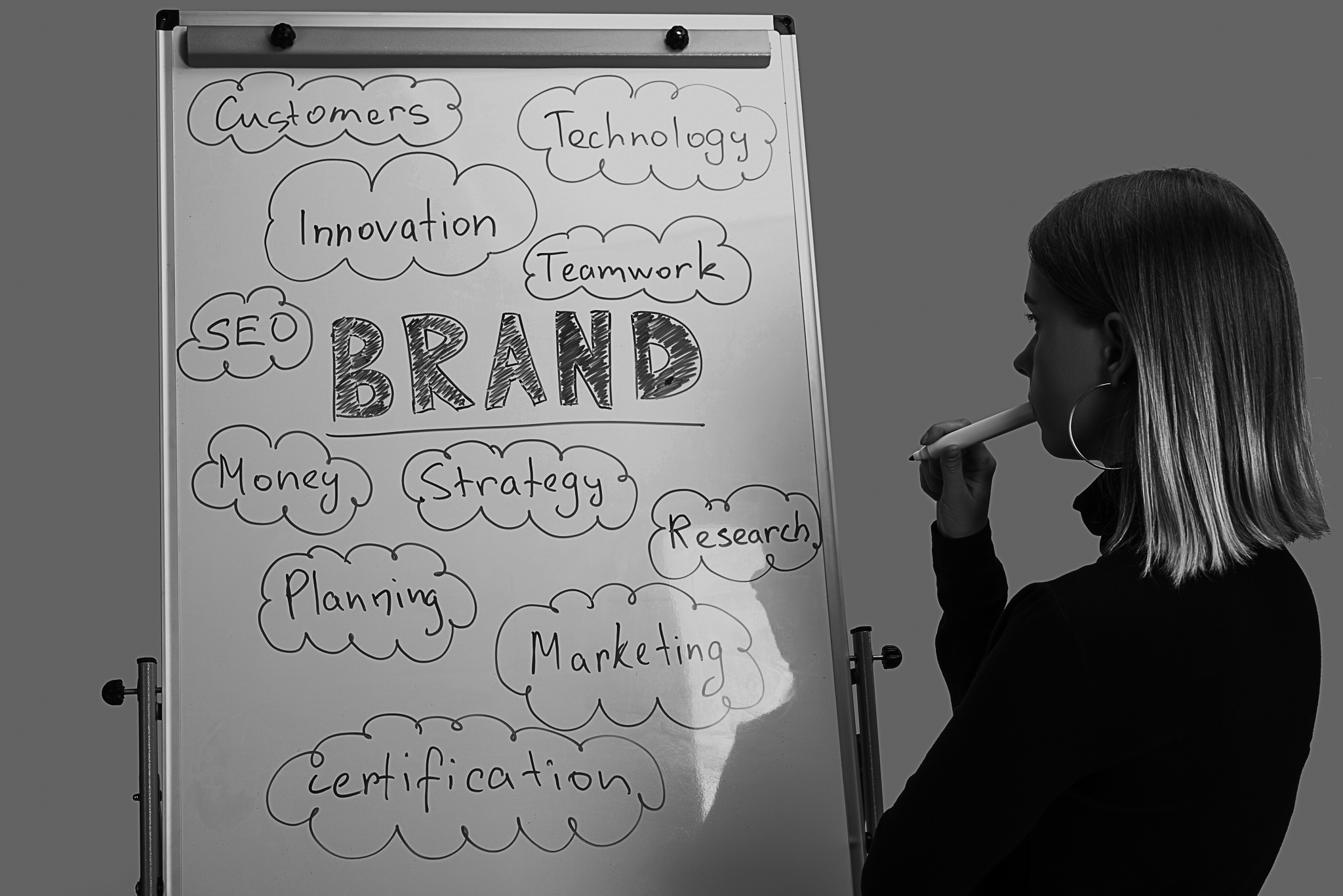 side-view-of-pensive-businesswoman-standing-near-w-2023-11-27-05-25-18-utc