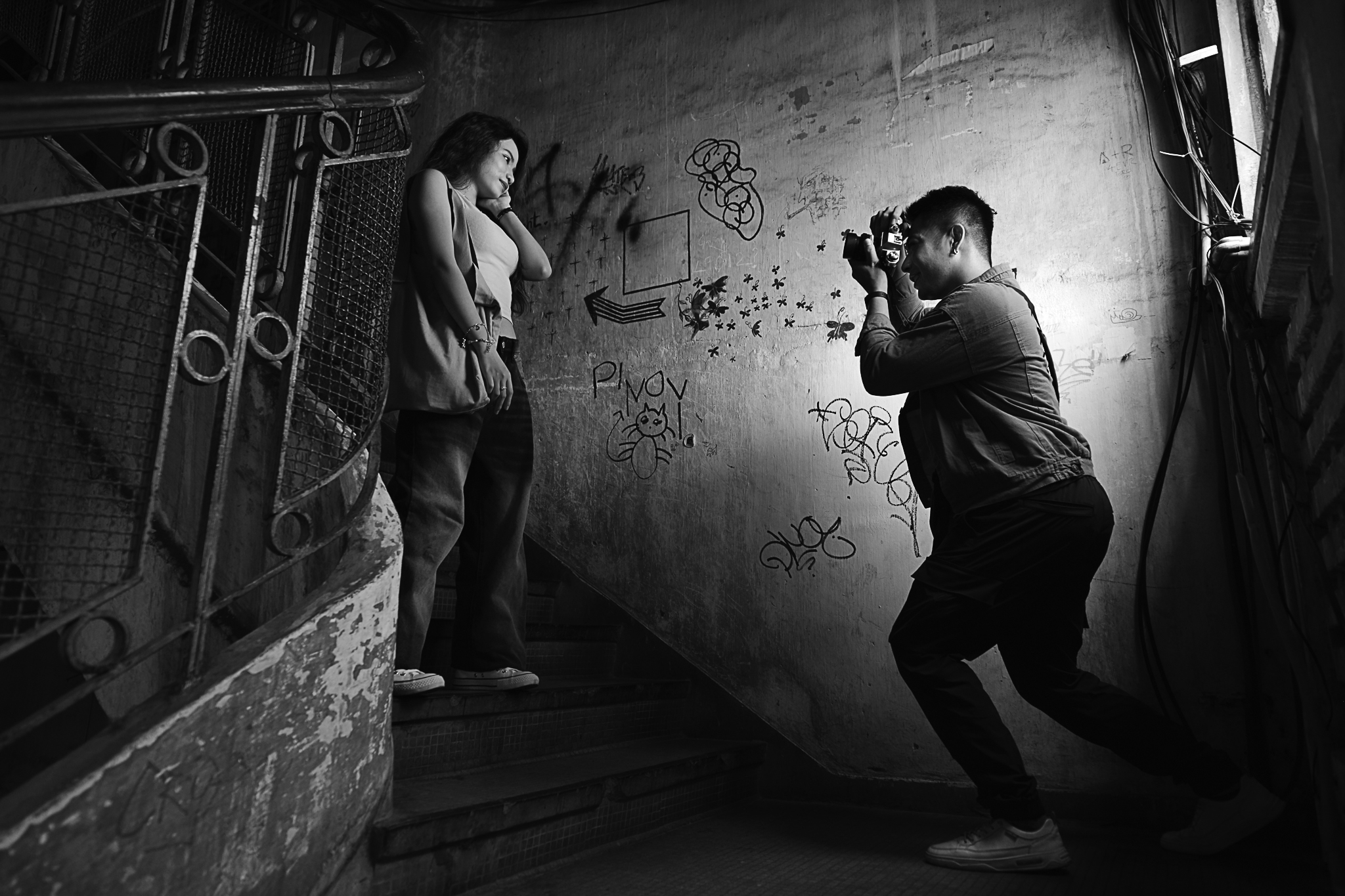 young-man-photographing-girlfriend-2023-12-28-22-30-31-utc